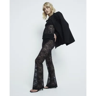 Black Lace Flared Trousers sold by River Island