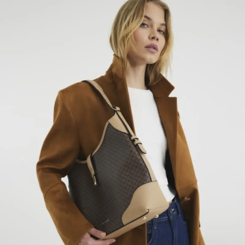 Brown Faux Leather Monogram Slouch Bag sold by River Island