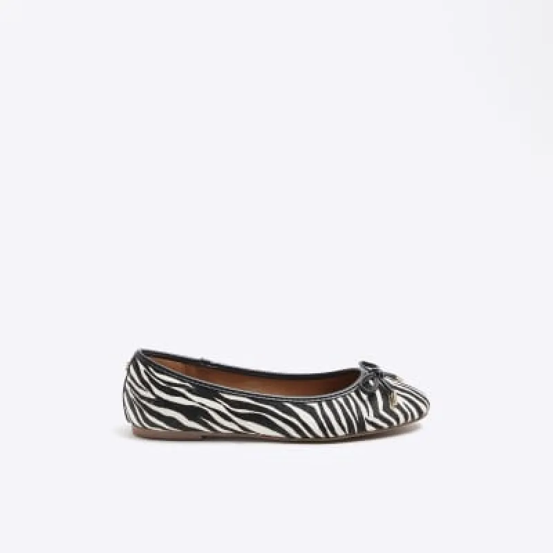 White animal print ballet pumps sold by River Island