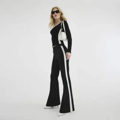 Black Long Sleeve Colour Block Fitted Top sold by River Island