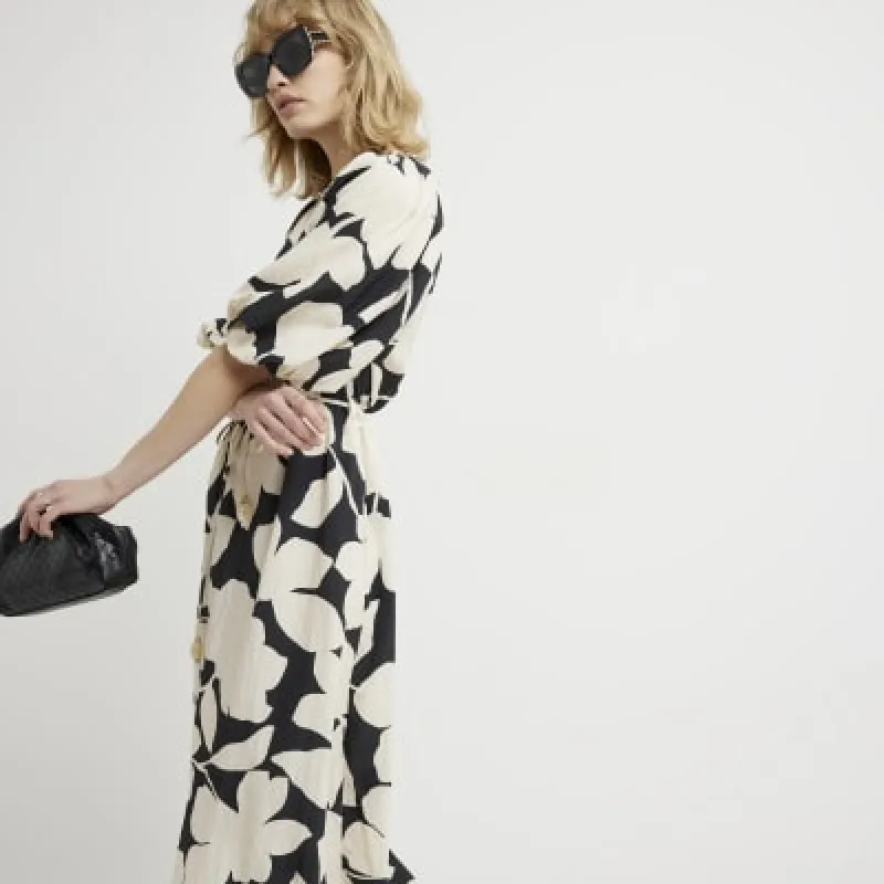 Black floral puff sleeve shift midi dress sold by River Island
