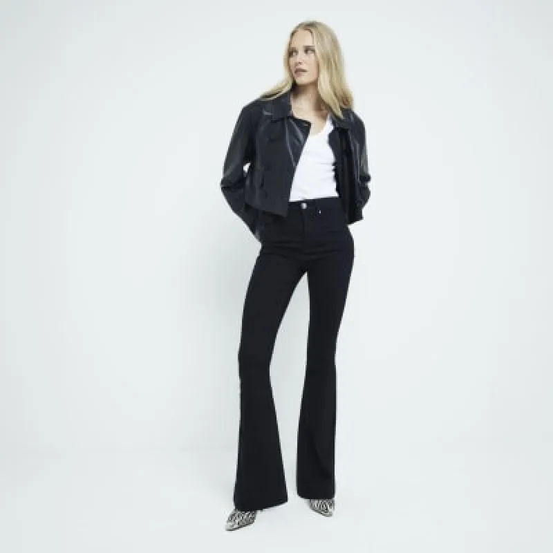 Black high waisted tummy hold flared jeans sold by River Island