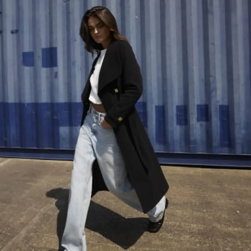 Black belted wrap coat sold by River Island