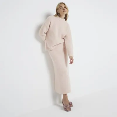 Pink fluffy knit jumper sold by River Island
