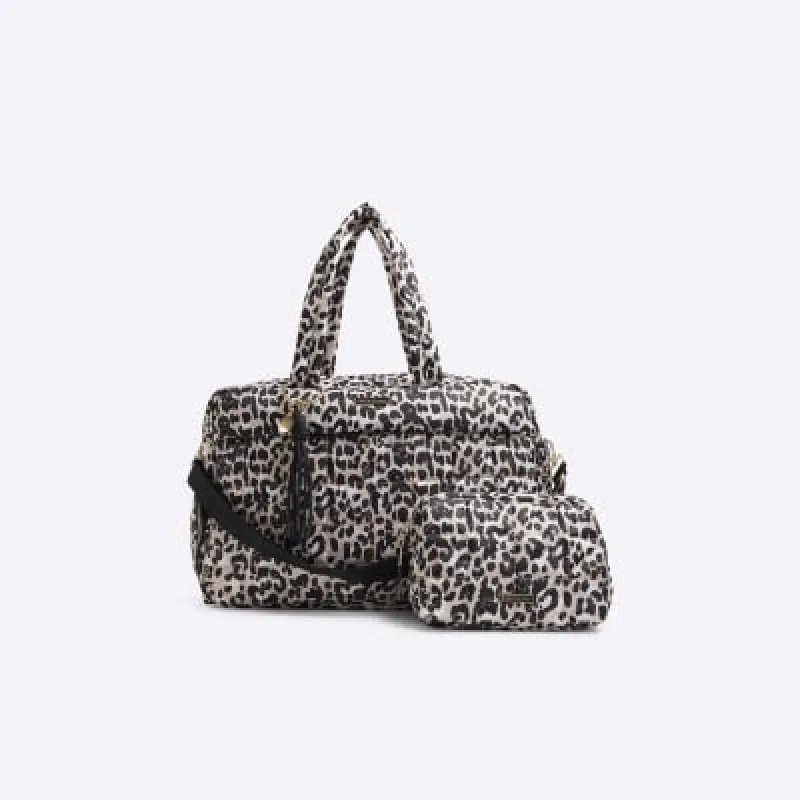 Beige quilted leopard travel and makeup bag sold by River Island