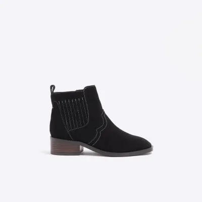 Black suede block heeled boots sold by River Island