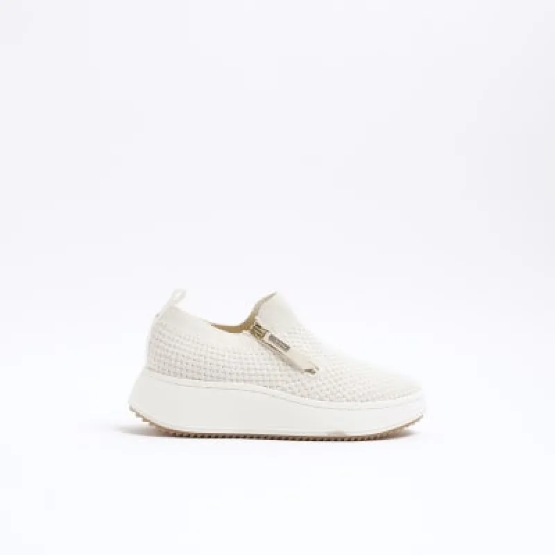 Beige wide fit knitted wedge trainers sold by River Island