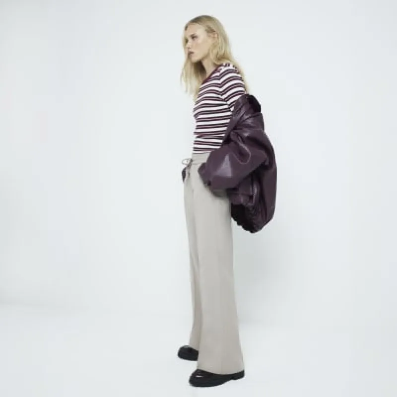 Beige tailored wide leg joggers sold by River Island