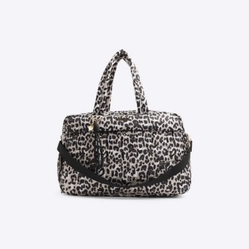 Beige quilted leopard print travel bag sold by River Island