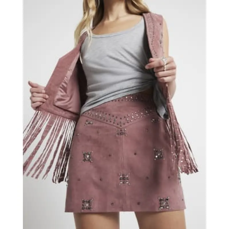 Pink suede studded mini skirt sold by River Island