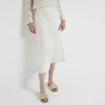 Cream crochet embellished mule sandals sold by River Island