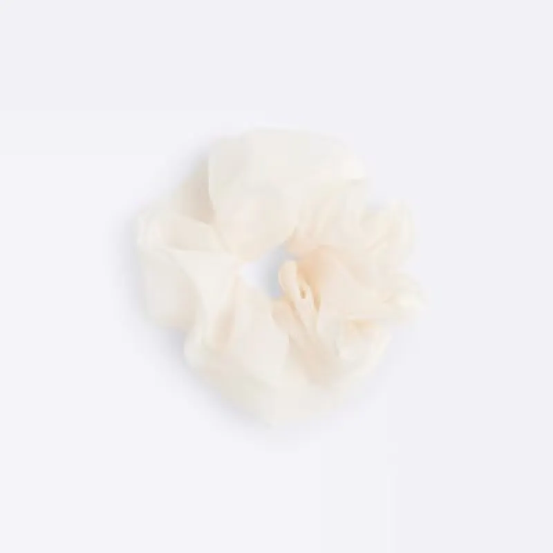 Pink organza hair scrunchie sold by River Island