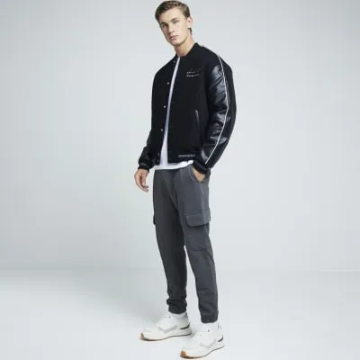 Grey slim fit stretch textured cargo joggers sold by River Island