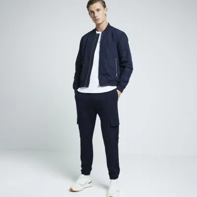 Navy regular fit stretch cargo smart joggers sold by River Island