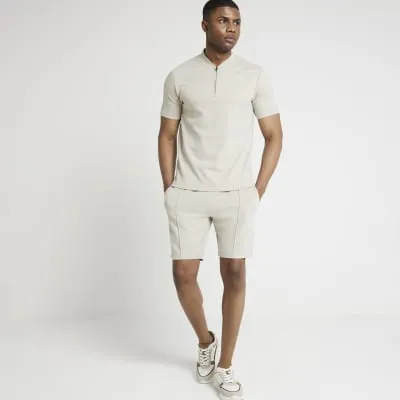 Stone slim fit textured shorts sold by River Island