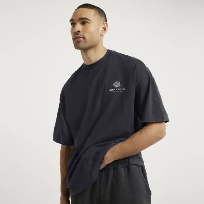 Black oversized embroidered graphic t-shirt sold by River Island
