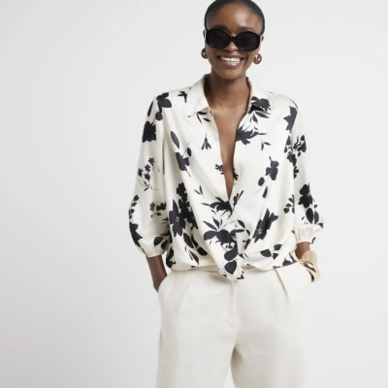 Cream floral print wrap shirt sold by River Island