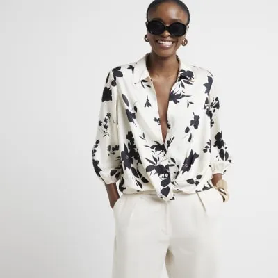 Cream floral print wrap shirt sold by River Island