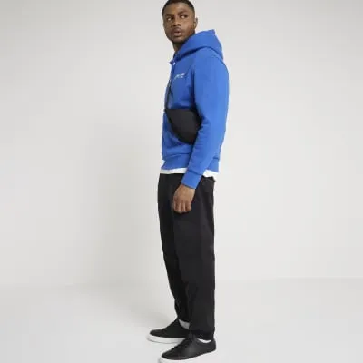 Black slim fit cuffed cargo trousers sold by River Island