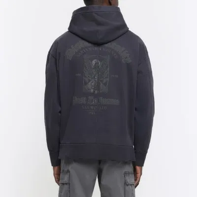 Washed black regular gothic graphic hoodie sold by River Island
