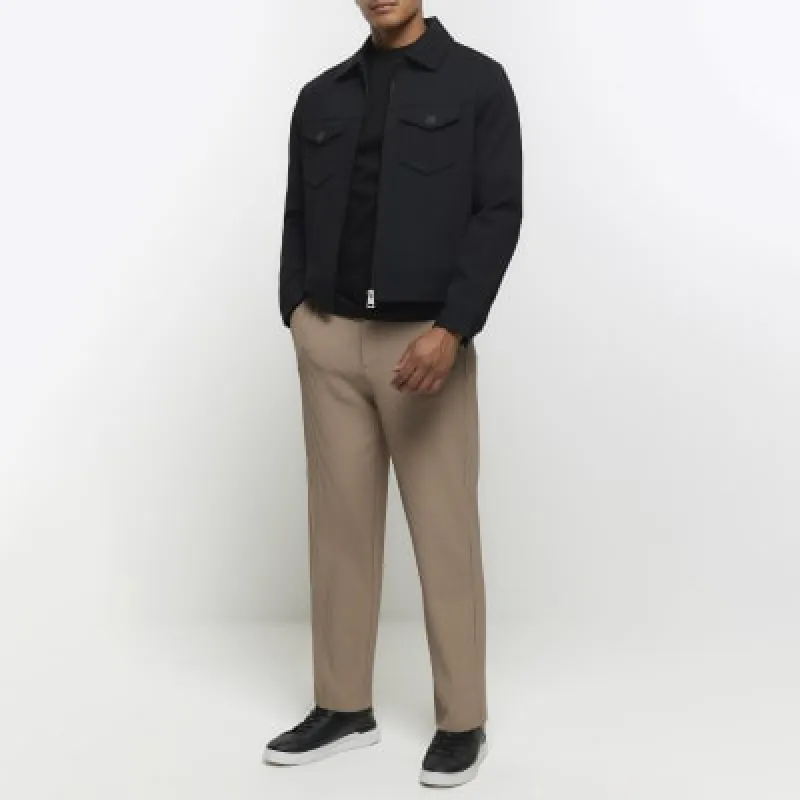 Stone tapered fit plisse trousers sold by River Island