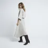 Beige wool blend asymmetric midi skirt sold by River Island