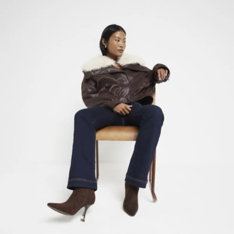 Petite Blue Pocket Flared Jeans made by River Island