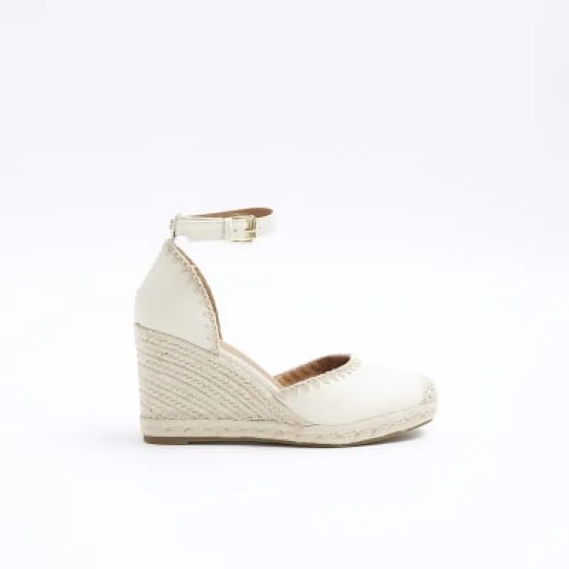 Cream stitch wedge espadrille sandals sold by River Island