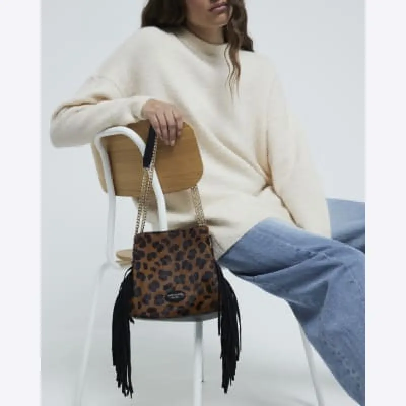 Brown Fringed Leopard Leather Bucket Bag sold by River Island