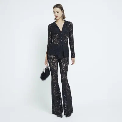 Black Lace Flare Trousers sold by River Island