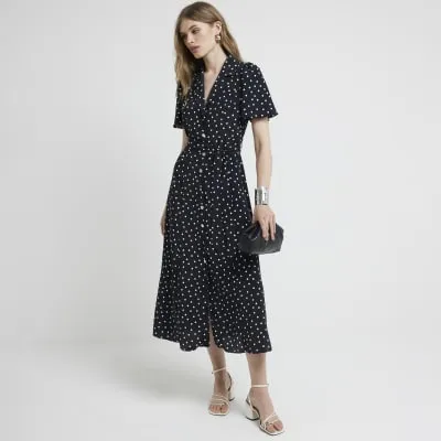 Black spot belted midi shirt dress sold by River Island
