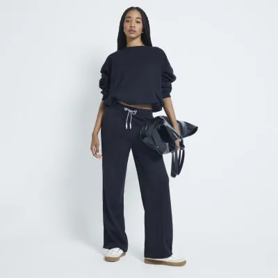 Black Long Sleeve Bubble Hem Sweatshirt sold by River Island