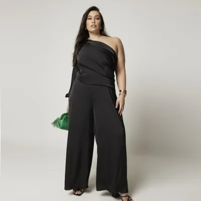 Plus black one shoulder wide leg jumpsuit sold by River Island