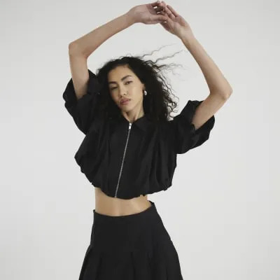 Black Zip Front bubble Hem Cropped Shirt sold by River Island