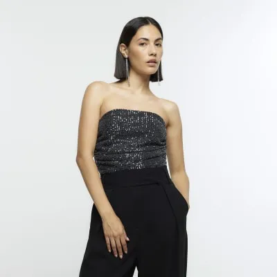Grey sequin bandeau top sold by River Island