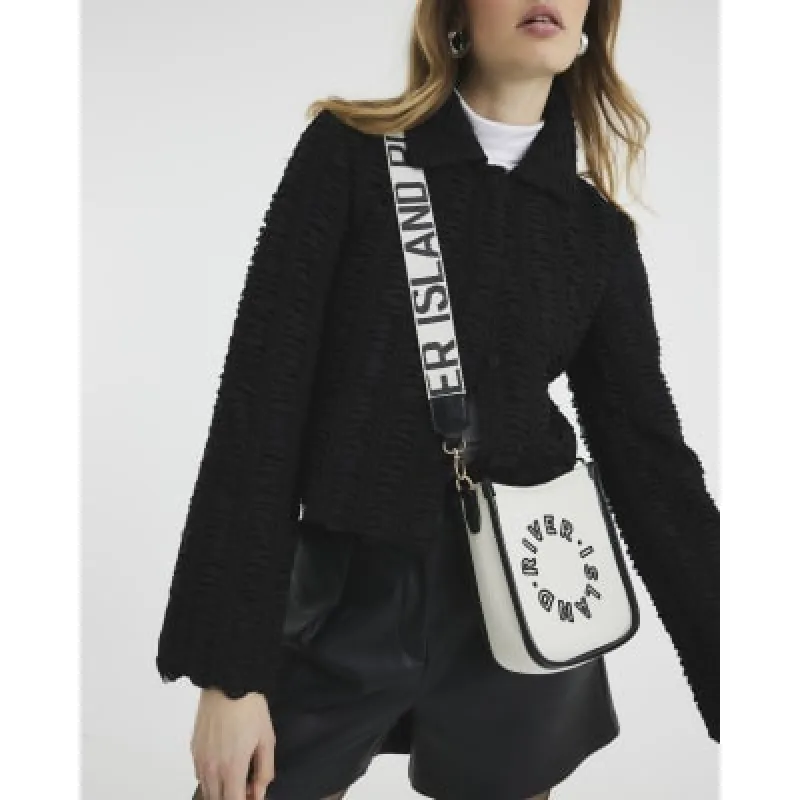 White Canvas RI Messenger Bag sold by River Island