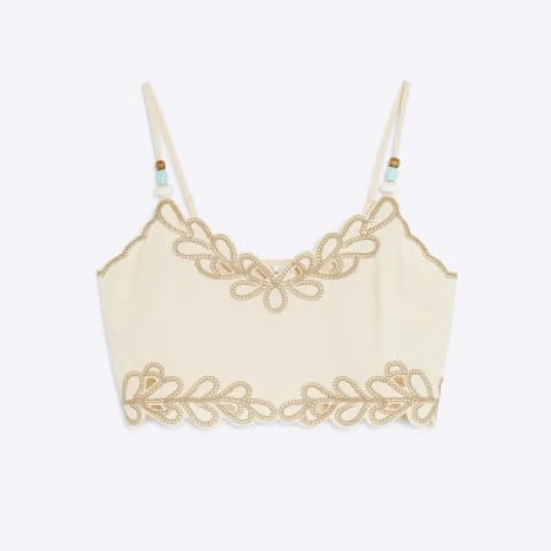 Petite Cream Sleeveless Crop Top sold by River Island