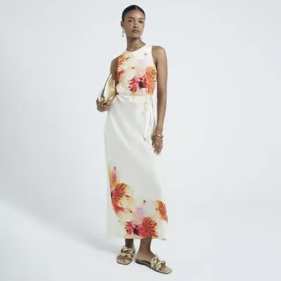 Cream floral belted slip midi dress sold by River Island