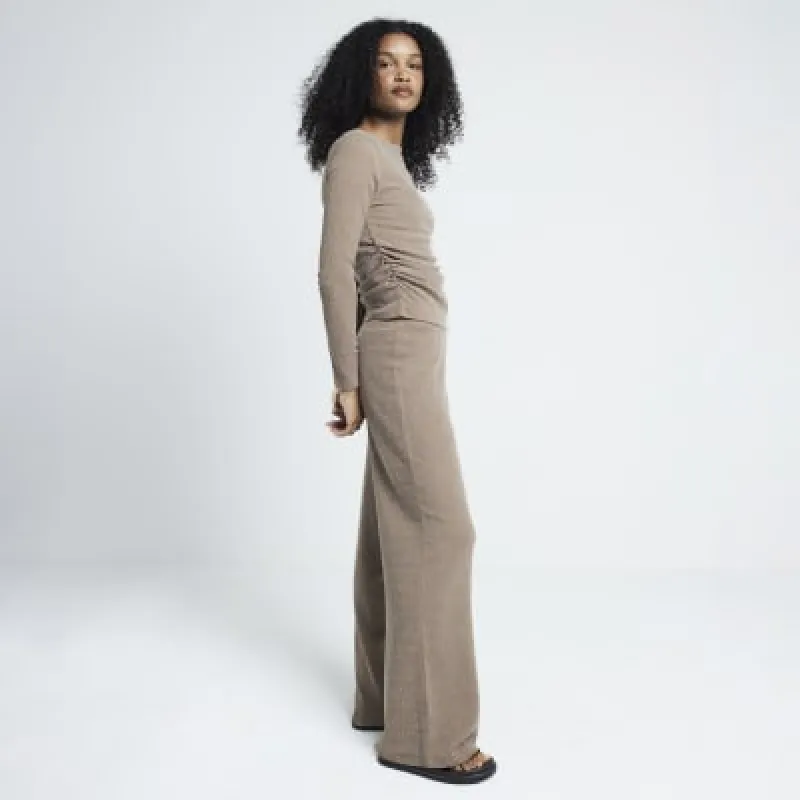Brown textured ruched long sleeve top sold by River Island