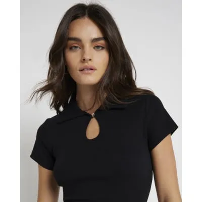 Black cut out polo t-shirt sold by River Island
