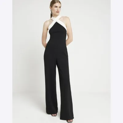 Black halter neck colour block jumpsuit sold by River Island