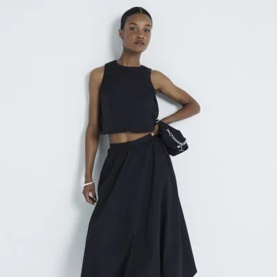 Black Bubble Hem Top sold by River Island