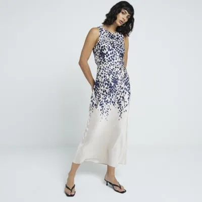 Cream satin leopard belted slip midi dress sold by River Island