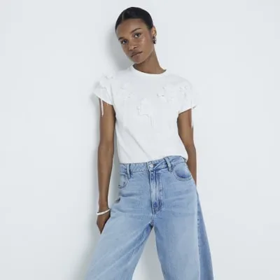 White embellished floral tassel t-shirt sold by River Island