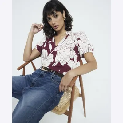 Red floral V neck blouse sold by River Island