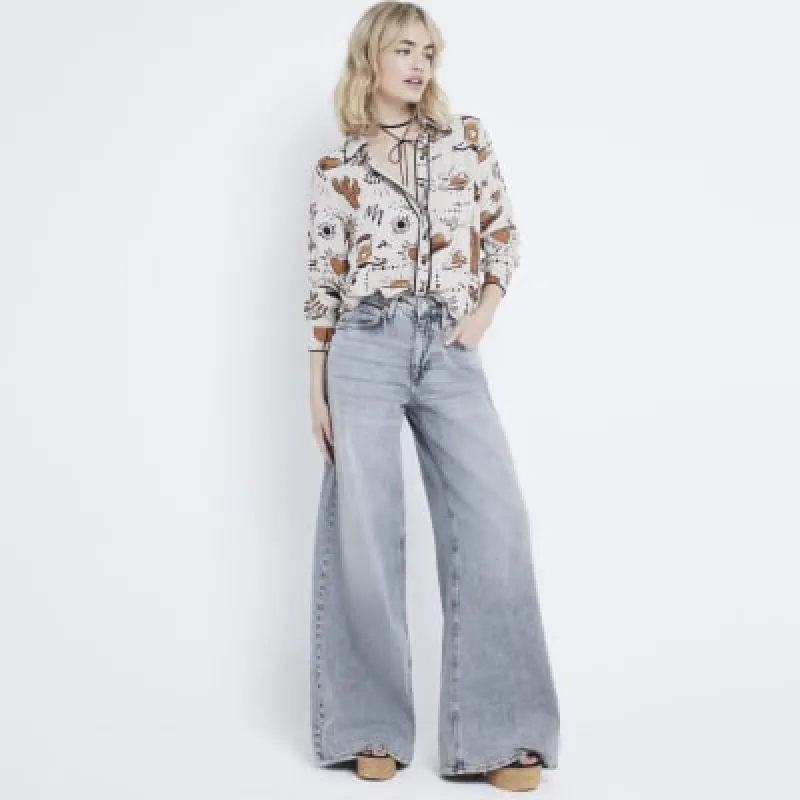 Beige western print shirt sold by River Island