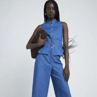 Blue Denim button up waistcoat sold by River Island