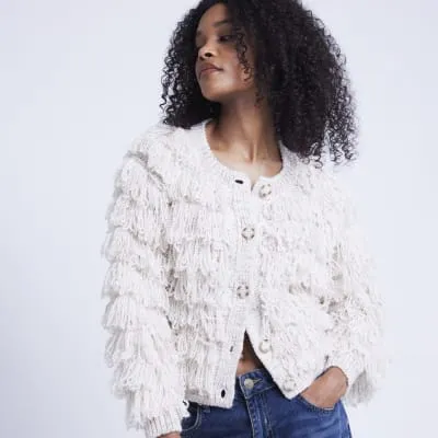 Cream fringe button up cardigan sold by River Island