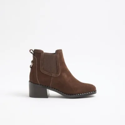 Brown suede block heeled ankle boots sold by River Island