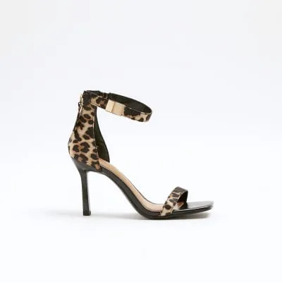 Beige wide fit leopard heeled sandals sold by River Island